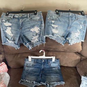 Three pairs of American Eagle jean shorts